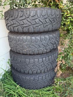 285 70 17 Chevy GMC tires rims Silverado Tahoe Suburban Avalanche Sierra Yukon Cadillac Escalade rims and tires 80%