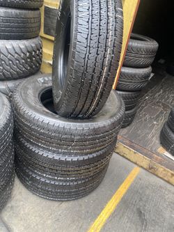 SET FOUR GOOD USED TIRES LT 275/70/18 SEMI NEW 95%TREAD LIFE $400 PRICE INCLUDES PROFESSIONAL INSTALLATION AND TAX