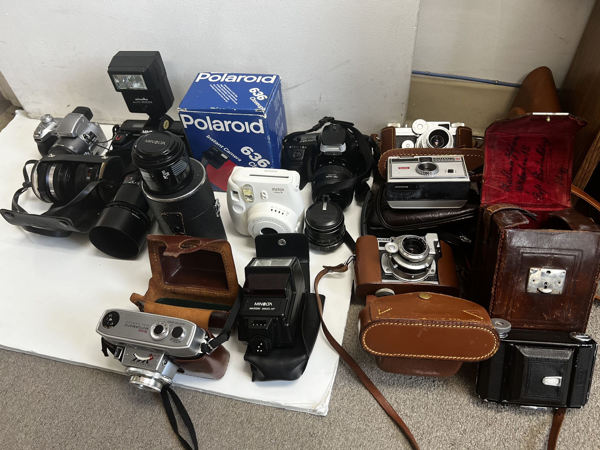 Huge collection of vintage and antique cameras and lenses