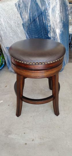 good condition Brown Cherry Swivel Leather Counter Stool for both