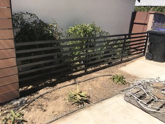 Custom metal and wood gates and fences