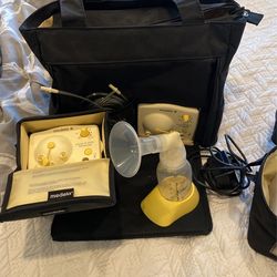 Madela Breast Pump- LIKE NEW