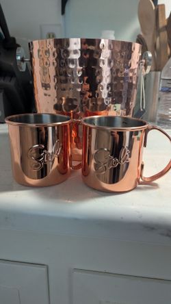 Copper ice bucket and 2 stoli Moscow mules