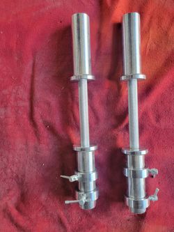 OLYMPIC DUMBBELL BARS  2"HOLE WITH COLLARS 
11525 S HALSTED/7111.S WESTERN 
30$  CASH ONLY AS IS
