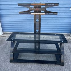 TV Stand with TV Holder -( size: 50”x 20”x 23”in high, 50”in up to holder )- Used 