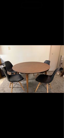 Brown expandable table with 4 ikea black chairs included