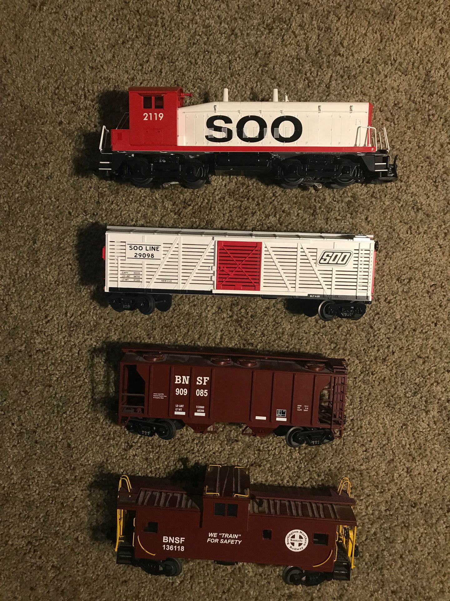 4- O scale MTH Soo line engine and three cars