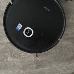 Black Roomba with charger