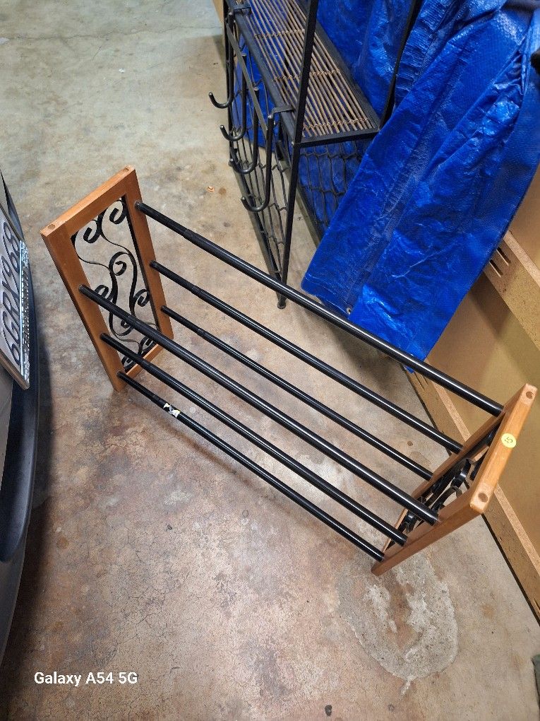 Shoe Rack It Expands In Length. 5 Dollars