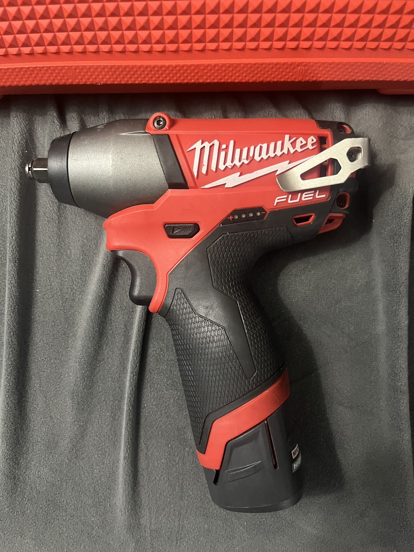 Milwaukee FUEL M12 3/8 Impact Wrench W/HIGH OUTPUT BATTERY Plus 3/8 Socket Set