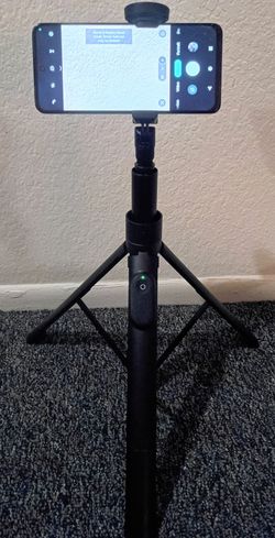 2-in-1 Portable Selfie Stick Tripod Wireless Bluetooth Remote Control.