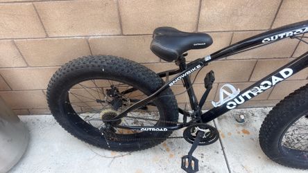 Outroad Snowbike — basically a fat-tire mountain bike built for rough terrain.