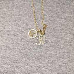 necklace,and two charms all 14k yellow gold 