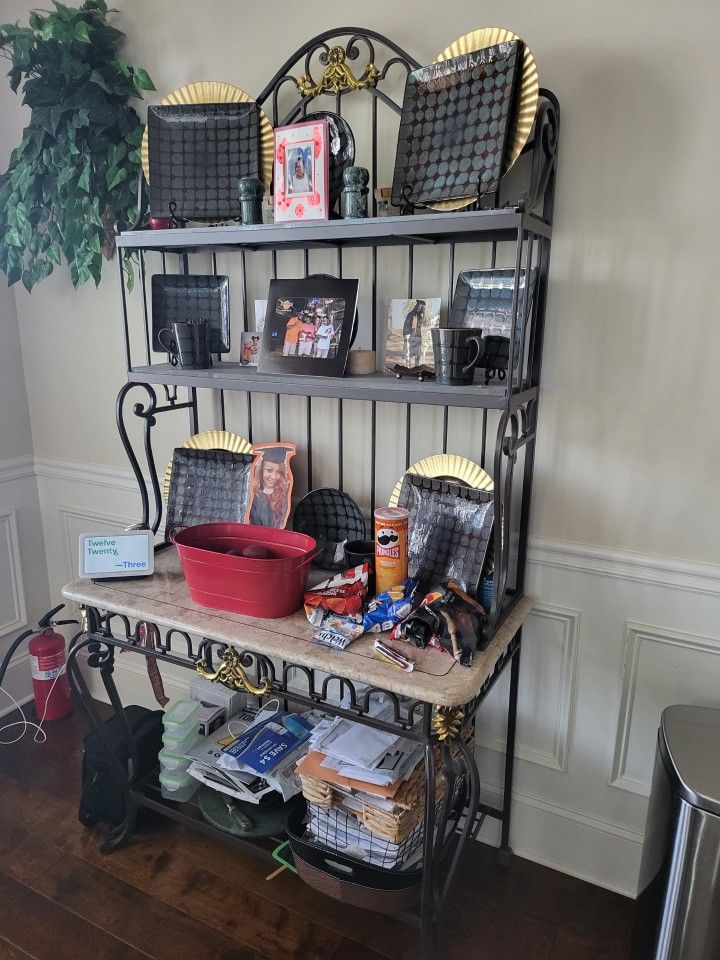 Baker's Rack
Table
6 chairs 
2 bar stools 