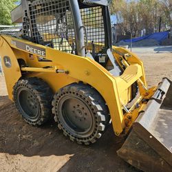 John Deere  313 Skidsteer