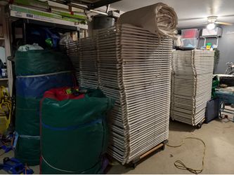 Tables, chairs, water slide, banners for sale