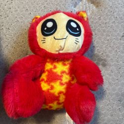 red and yellow monster plush