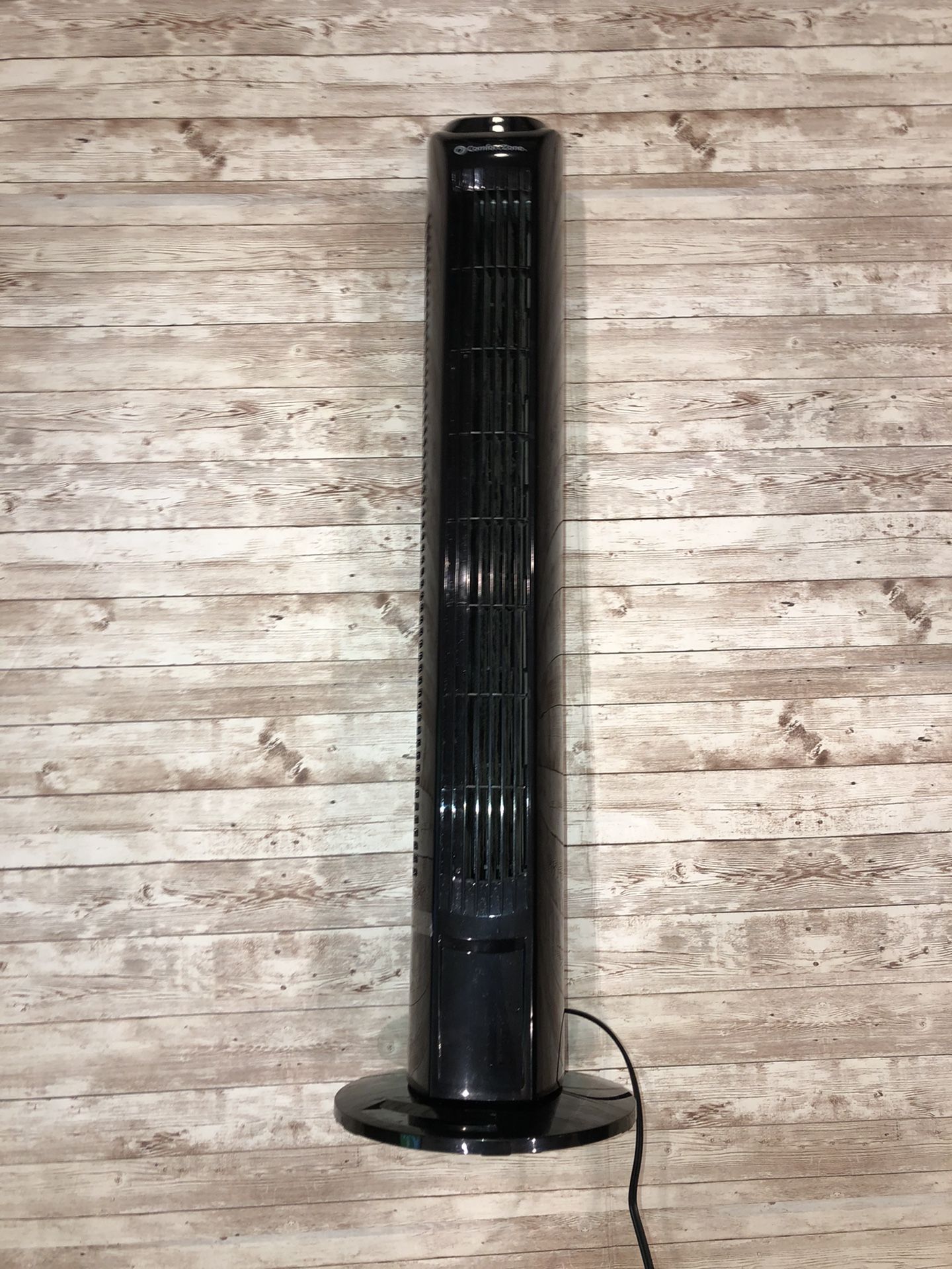 Comfort zone oscillating tower fan with remote control