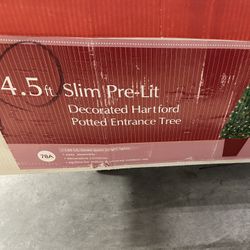 FREE  4.5 Foot Potted Christmas Tree