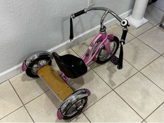 Schwinn tricycle for girls. Look the price new Good condition