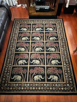 Area Rug with Elephant and Palm Tree print