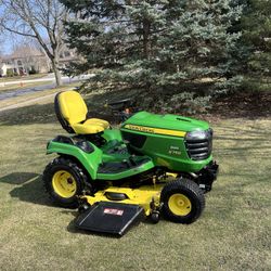 John Deere X750 Diesel Garden Tractor Riding Lawn Mower With A 60 In Deck And Yanmar Diesel
