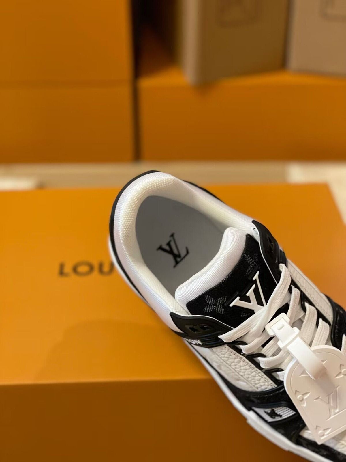 Louis Vuitton Black/White Sneakers Size 12 (Price negotiatable) for Sale in  Oaklandon, IN - OfferUp