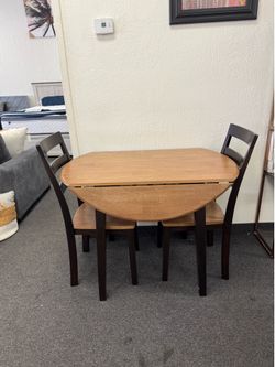 Small drop leaf table by Ashley furniture