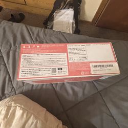 Nintendo Switch Lite – Coral – With Original Box – Great Condition