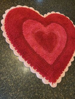 Heart shaped rug, red and pink, thick plush, approx 20x23"