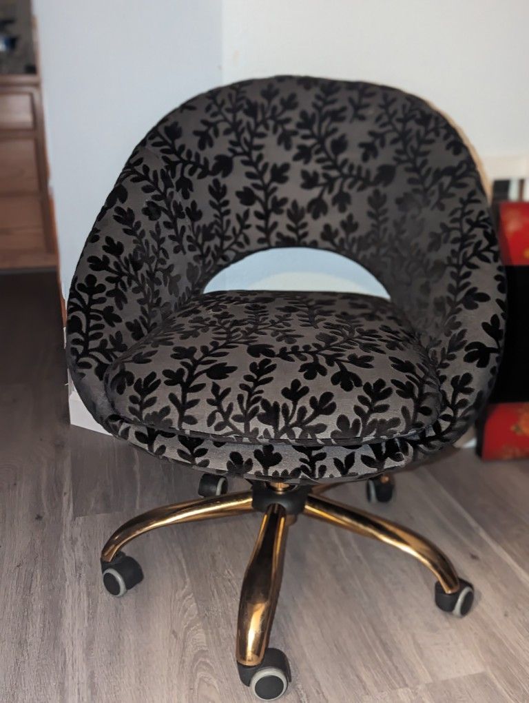 Flowery Black & Gold Rolling Chair $60