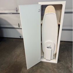 Iron-a-way. Built in ironing board