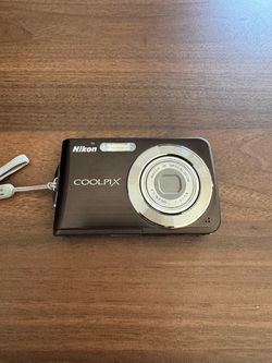 Nikon S210