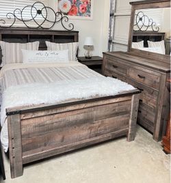 Full-size bedroom set. Includes a bedframe with Storage, one nightstand and a dresser with mirror.