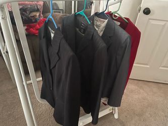 4 women’s business suits size 12 &. 14
