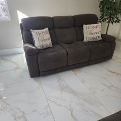 ALMOST NEW FABRIC RECLINER SOFA AND LOVESEAT