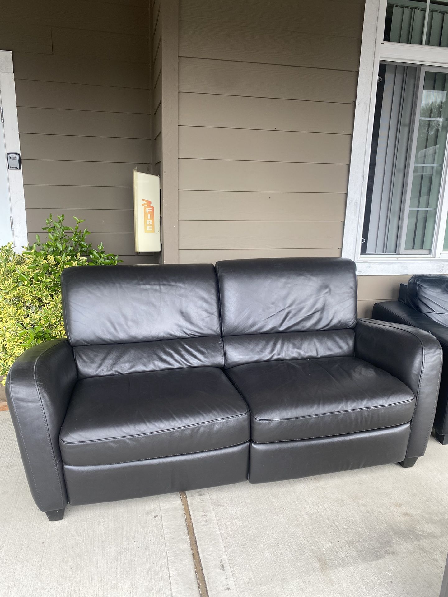 Black Real Leather Reclining Loveseat 