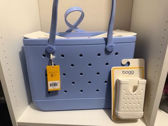 Blue Bogg bag with white accessories $65