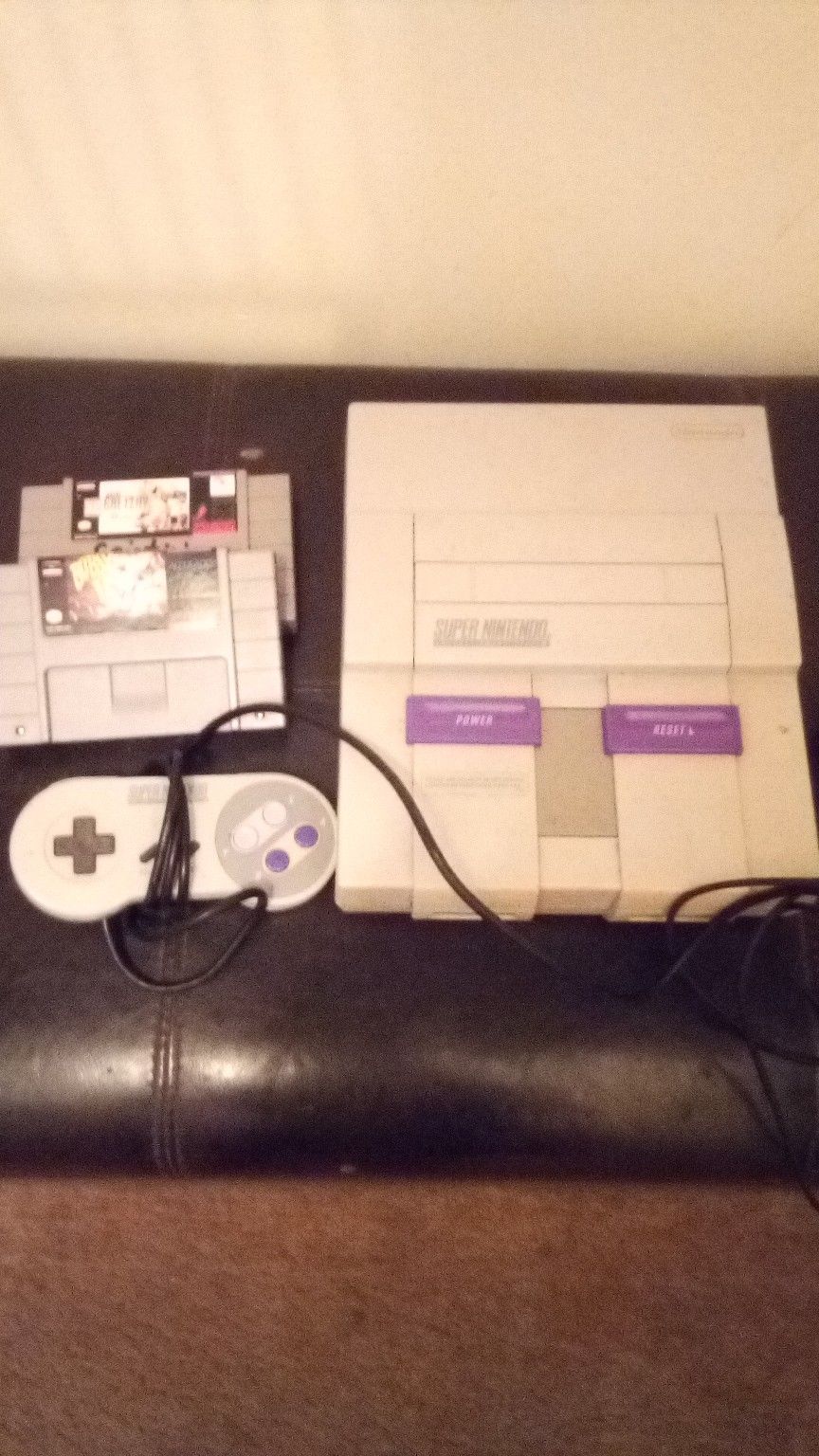Super Nintendo classic with controller and 2 games