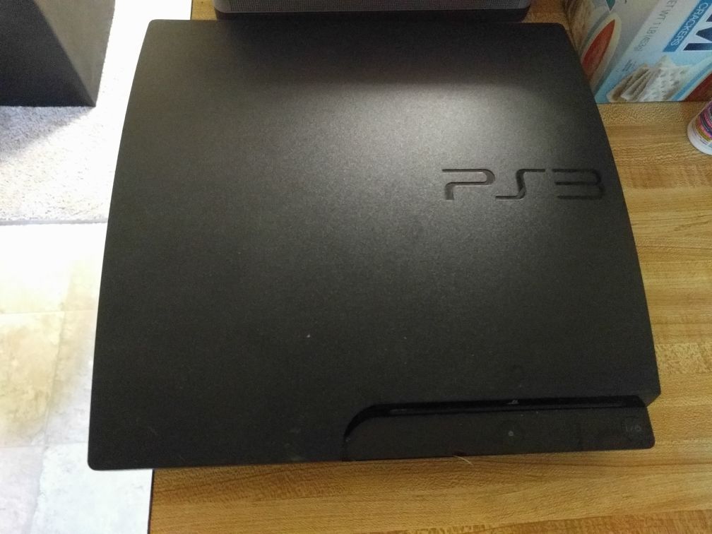 PS3 slim 320gb, controller, and 11 PS3 games