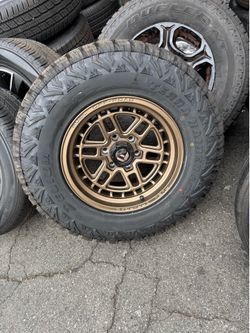 17x8.5. BRONZE FUEL WHEELS  285/79/17.  ATX. TIRE