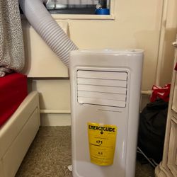 Portable AC Comes with a remote 