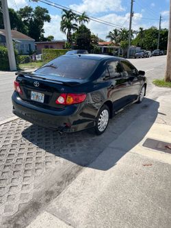 Toyota corolla 2010 tilulo limpio
