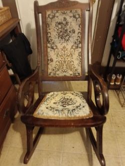 Antique Wood Rocking Chair with Floral Upholstery