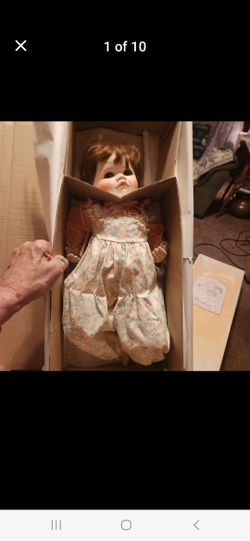 REDUCED TO $20.00

New in box...Collectible Doll "Sara" by Connie Walser Derek...she has never been out of the box....approximately 18 inches tall...