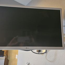 In Good Condition 24" LG White  frame  for used in a Kitchen 