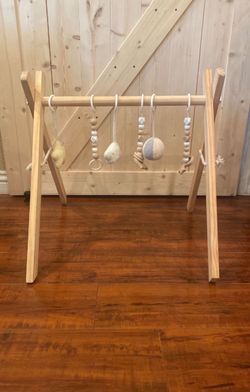 Wooden baby play gym