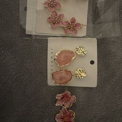 Brand new, unused. Modern high-fashion pink floral earrings