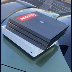 PS4 Pro / Xbox One S (with Cords)  / 5 PS5 Games / 2 Xbox Games 1 PS4 Controller And 7 PS4 Games