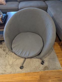 Grey Swivel Chair On Wheels